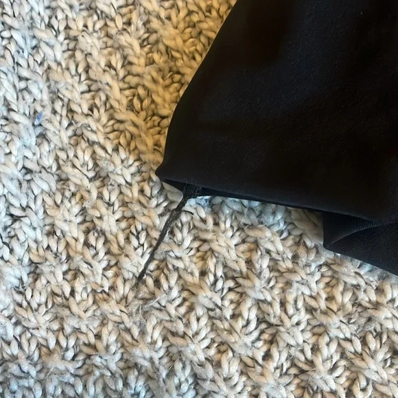 Black dress with asymmetrical length in size extra small - Picture 2 of 3